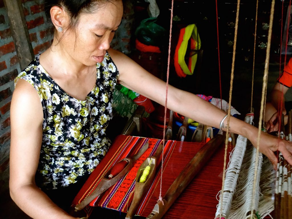 This lady was making new cloth one strand at a time by hand. She was given a bandana and told about a radio program to listen to stories about God. Pray that she does.