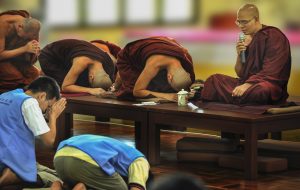 The monk announces over a loudspeaker the family name and dollar amount of the donation followed by a blessing of health, wealth, and prosperity.